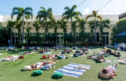 people do yoga outside at Eudemonia 2025