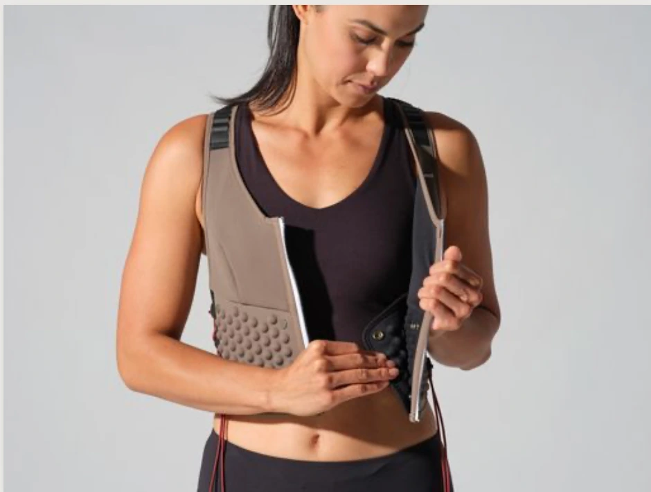 woman wears an Omorpho vest