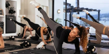 an in-studio Pvolve class with women working out